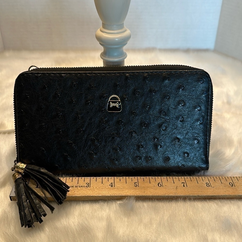 Black double zipper clutch wallet with silver tassels and spotted texture